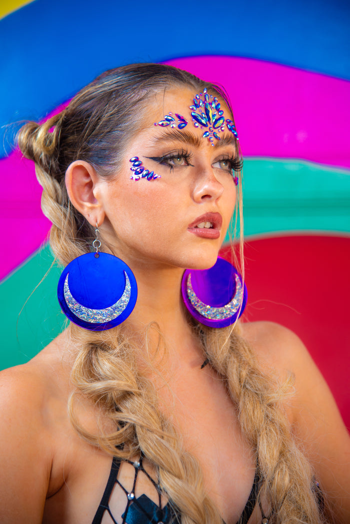 Verity Face Jewels — iridescent purple rhinestones applied to face